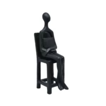 ESTÁTUA SENTADA PRETA
